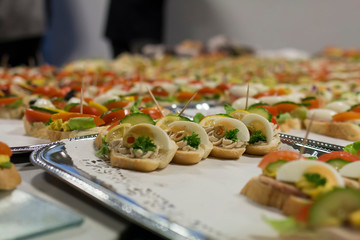 Plates with sandwiches served at a corporate event