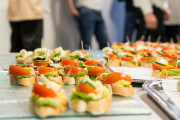 Plates with sandwiches served at a corporate event