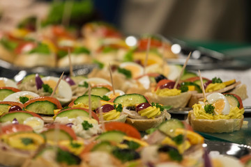 Plates with sandwiches served at a corporate event