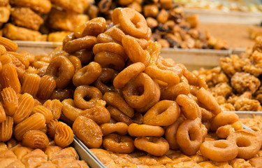 a bunch of oriental sweets on the market. Selective focus