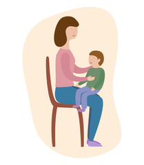 Mother is sitting with her son on the chair.