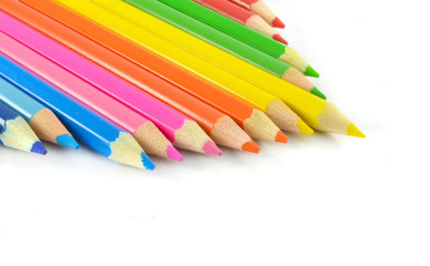 crayons isolated / Color pencils or wood crayons isolated on white background - colorful Colored Pencils in row