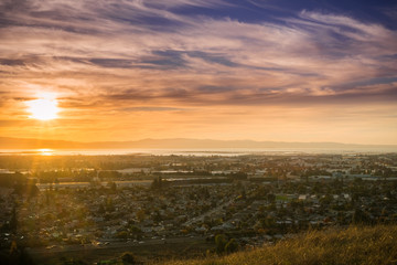 Sunset view of Hayward and Union City from Garin Dry Creek Pioneer Regional Park, east San...