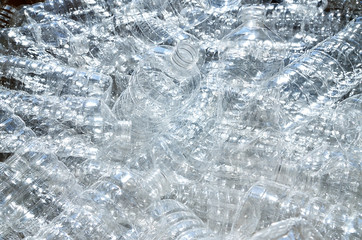 Bottle. Industrial production of plastic pet bottles. Factory line for manufacturing polyethylene bottles. Transparent food packaging