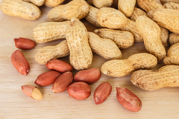 peanut in shell on wood background