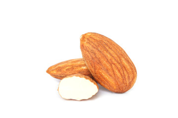 pile almonds seeds on white background.