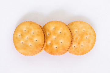 pile circle cracker top view on white background.