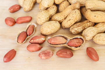 peanut in shell on wood background