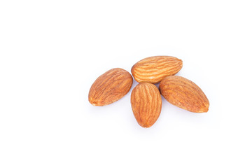 heap almonds on white background.