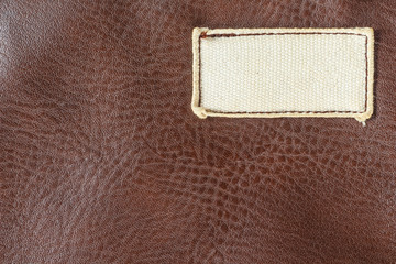 label white on leather brown.