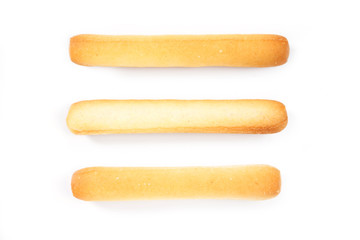 bread sticks top view on white background.