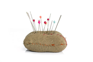 sewing pins on white background.