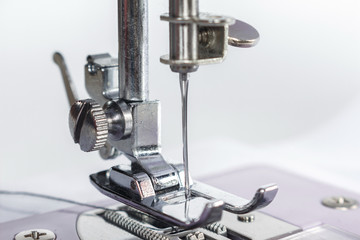 Sewing needle on white background.