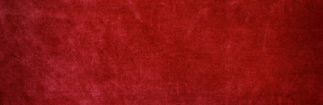 Banner.velvet texture background red color. Christmas festive baskground. expensive luxury, fabric, material, cloth.Copy space.