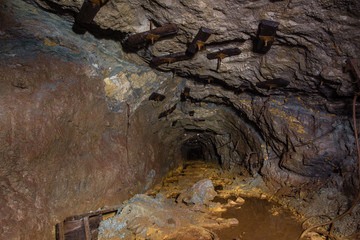 Underground abandoned gold iron ore mine shaft tunnel gallery passage
