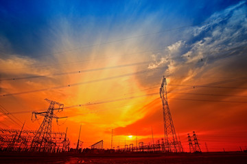 Electric tower, silhouette at sunset