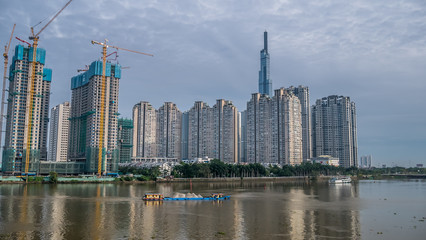 Skyscrapers in Ho Chi Minh City Vietnam. View from the river bank.