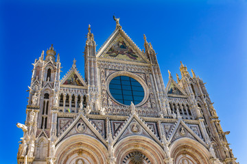 Naklejka premium Facade Towers Mosaics Cathedral Siena Italy