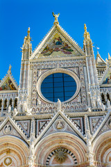 Fototapeta premium Facade Towers Mosaics Cathedral Siena Italy