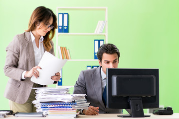 Two colleagues working in the office