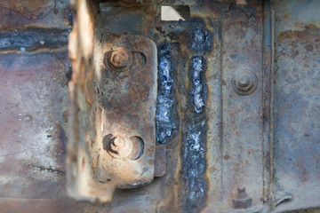 badly welded rusty metal