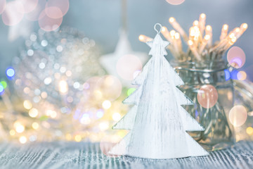 winter holidays background with blurred christmas lights and decorations