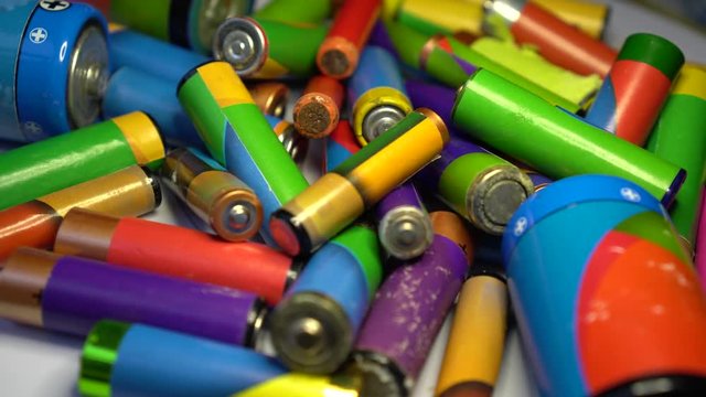 A Lot Of Used Alkaline Batteries For Recycling. Battery acid and corrosion