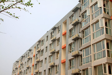 Fototapeta na wymiar Student apartment building exterior in a school, China