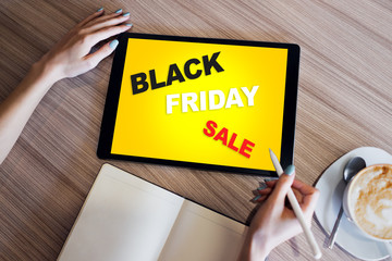 Black friday sale. E-commerce and online shopping concept on tablet screen.