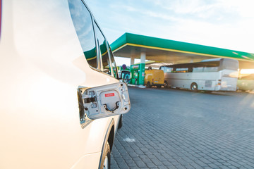 gas station diesel car in line fuel up