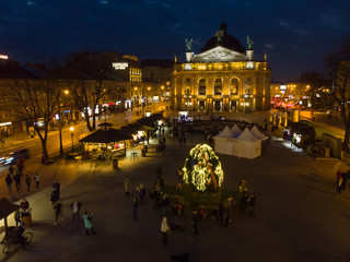 Naklejka premium beautiful cityscape of old european city in night. aerial view
