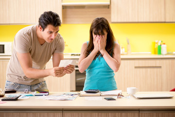 Fototapeta premium Young family struggling with personal finance