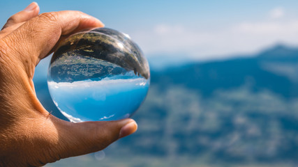 Crystal ball alpine landscape shot at Fuegen - Tyrol - Austria