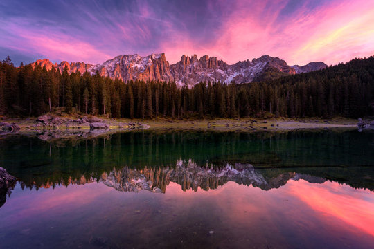 Beautiful sunset at Carezza lake, Dolomites, Italy, Europe