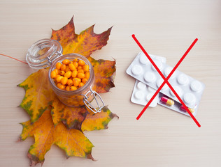 sea-buckthorn berries and autumn leaves, alternative medicine