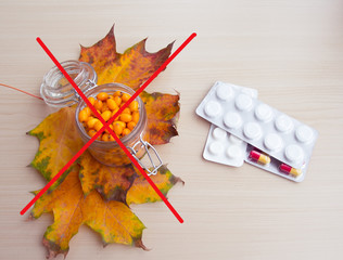 sea-buckthorn berries and autumn leaves, alternative medicine