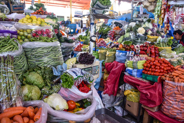 Arequipa, Peru - October 7, 2018: Fresh fruit and vegetable produce on sale in the central market,...