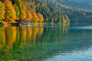 Beautiful blue mountain lake on a warm fall season day