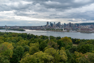 Fototapeta na wymiar Montreal Cityscape Skyline with river in foreground