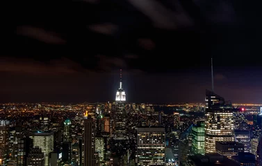 Fotobehang Looking towards the Empire State Building by night © Charles