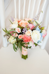 Sweet wedding Bouquet with roses of the Bride