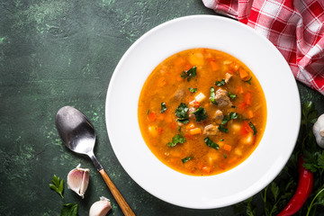 Traditional Hungarian goulash soup on the table.