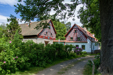 Fototapeta na wymiar Outdoor museum Doubrava near historical city Cheb - folk architecture frame house - Czech Republic