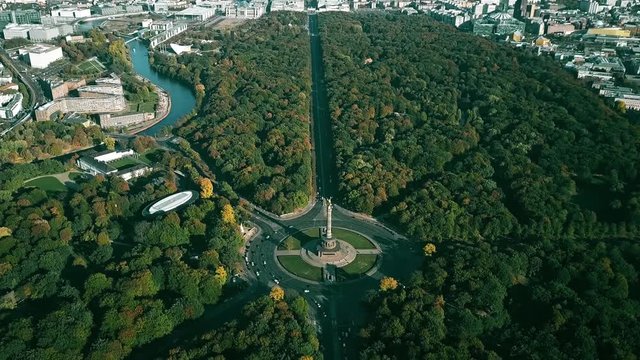 Hyperlapse of the Tiergarten Park and the Victory Column roundabout traffic. Aerial view of Berlin, Germany