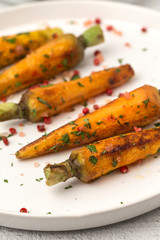 Healthy roasted carrots On white background