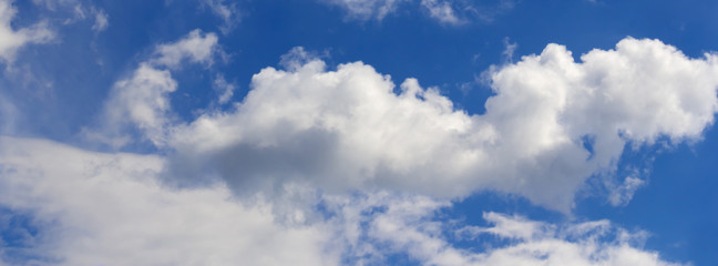 white clouds against a blue sky