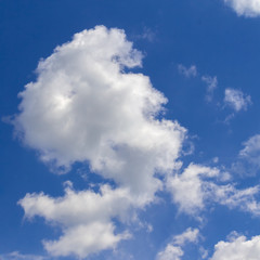 white clouds against a blue sky