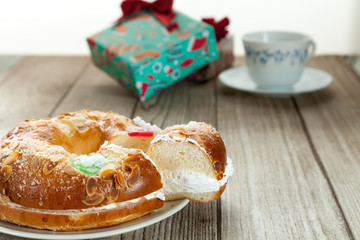 Spanish typical dessert of epiphany, present and coffe