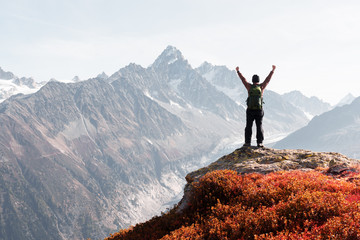 Amazing view on Monte Bianco mountains range with tourist on a foreground. Vallon de Berard Nature...