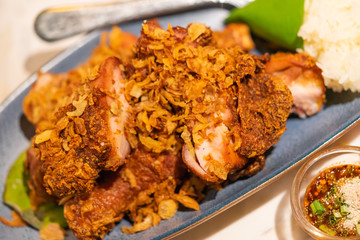 Thai style deep fried chicken. Food background.